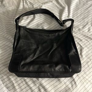 Authentic nylon Gucci handbag black in good condition